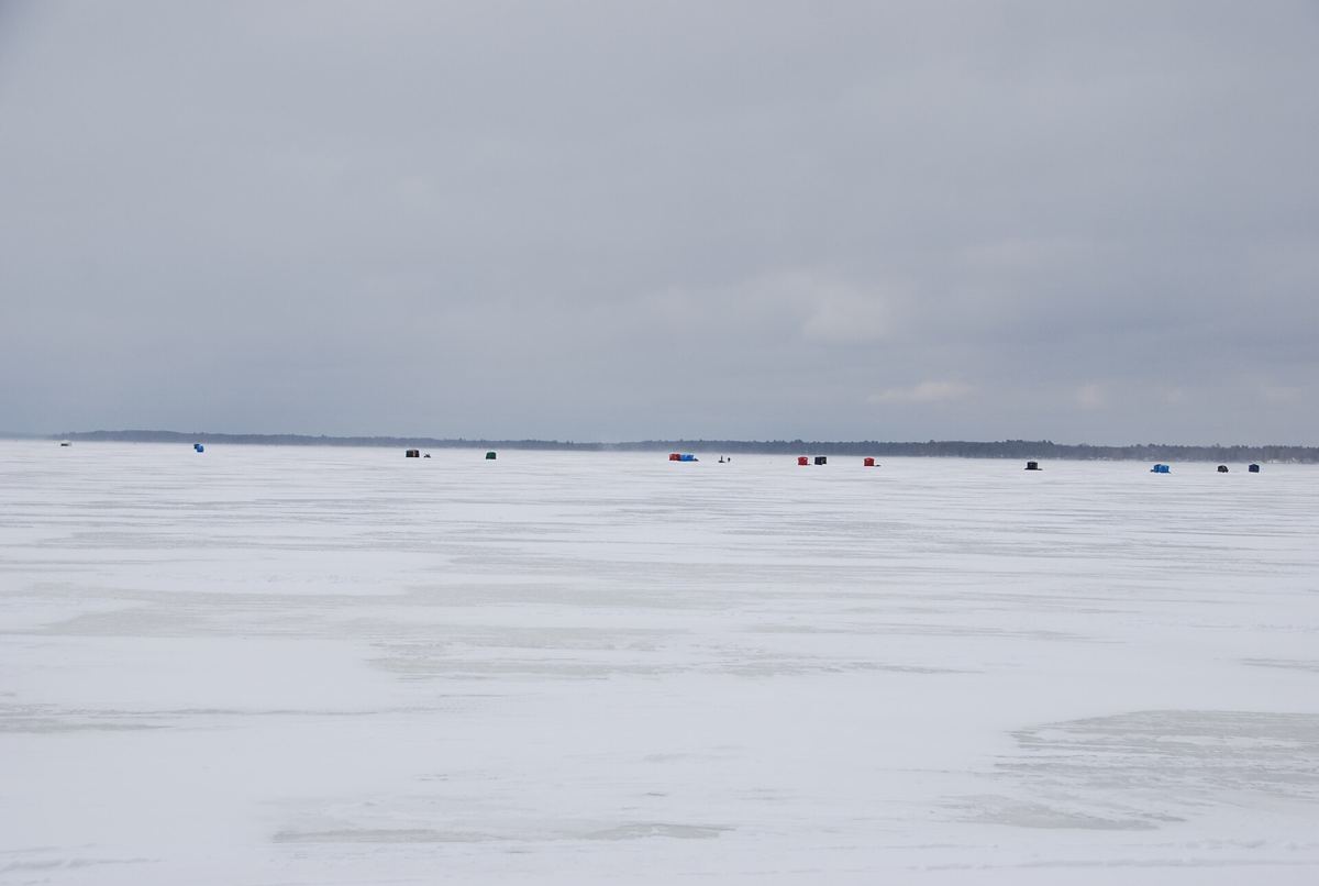 Ice fishing shanties scattered across Houghton Lake, Michigan